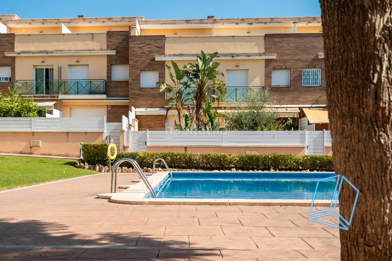 Foto f37b2783-cfda-4344-a43b-885903e46a9d. Haus mit parking in Calafell residencial Calafell