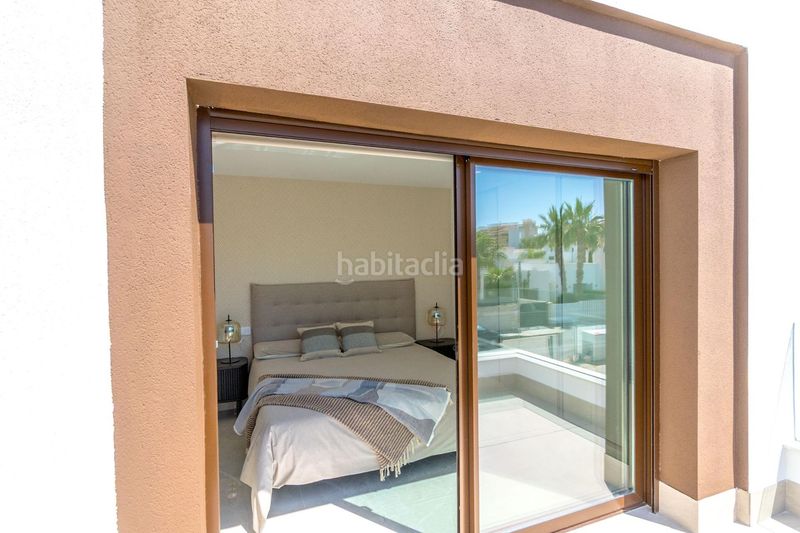 Foto c1e25cab-dc2f-4412-b80e-c9e02d2c4ee1. Casa adossada amb aparcament piscina a Benijófar