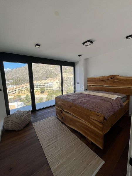 Foto 0cdc16de-6d70-41de-9d33-4d26f1da5670. Casa aparellada amb aparcament piscina a Altea la vella Altea
