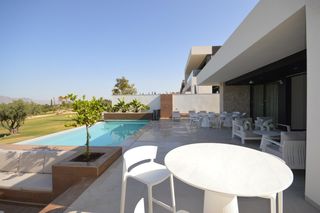 Chalet  La finca golf resort. Villa de 5 dormitorios y gran semisótano en primera linea de gol
