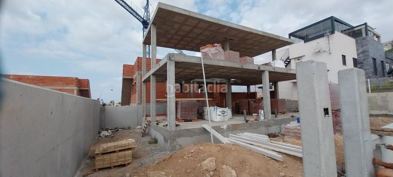 Foto c7fb5ed1-98a0-4ff1-a4cc-7be519748e74. Casa aparellada amb aparcament a El Alamillo Mazarrón