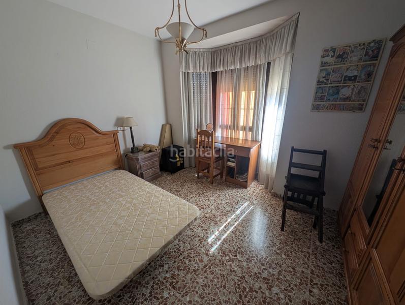 Foto 0b0d1655-7ed3-4277-a7a6-125c4e58a3d2. Casa adossada amb xemeneia calefacció aparcament a Lucena
