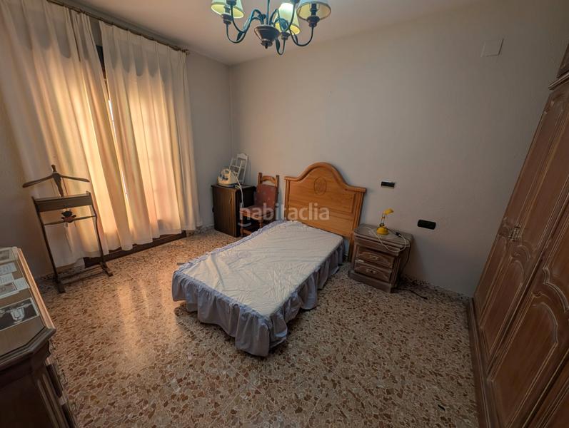 Foto 23af7ce6-c3c3-438f-bd7c-ecc7e76c2944. Casa adossada amb xemeneia calefacció aparcament a Lucena