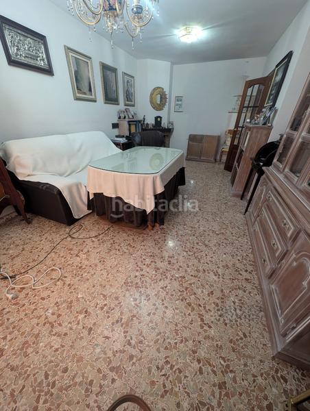 Foto 7593b1fa-3289-4544-a2fd-2a971c33e2a8. Casa adossada amb xemeneia calefacció aparcament a Lucena