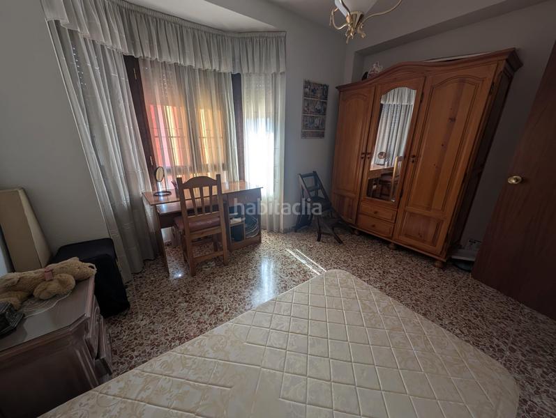 Foto cbcb5a85-273a-40b1-afcd-f2a598c86261. Casa adossada amb xemeneia calefacció aparcament a Lucena