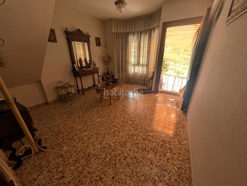 Foto d6681e45-3e3b-4c3c-b0dc-3845b865d1f9. Casa adossada amb xemeneia calefacció aparcament a Lucena