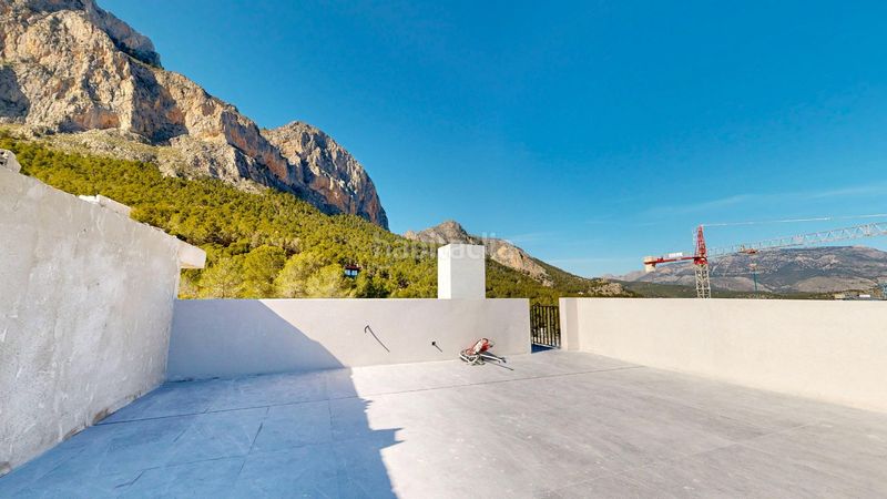 Foto c9fee287-aabb-47d1-83be-6859edd78ea9. Casa adossada amb aparcament piscina a balcón de ponoig - Polop paradis - Polop hills Polop