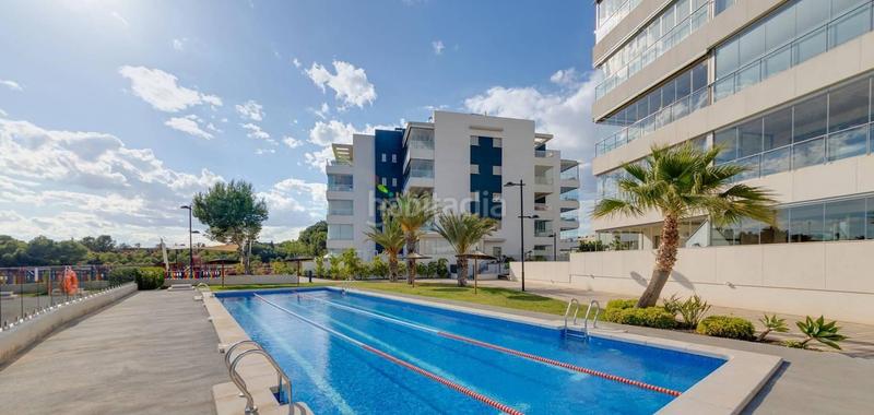 Foto c054313d-3926-493c-8730-2fe56c9ec775. Appartement mit parking pool in Villamartín-Las Filipinas Orihuela