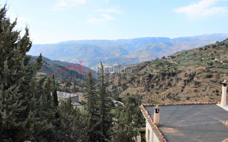 Foto 8e8c9fe2-8caf-46b4-9e8b-1fb7271e8d01. Piso vivienda rústica en pista del castaño con vistas al valle en Ohanes