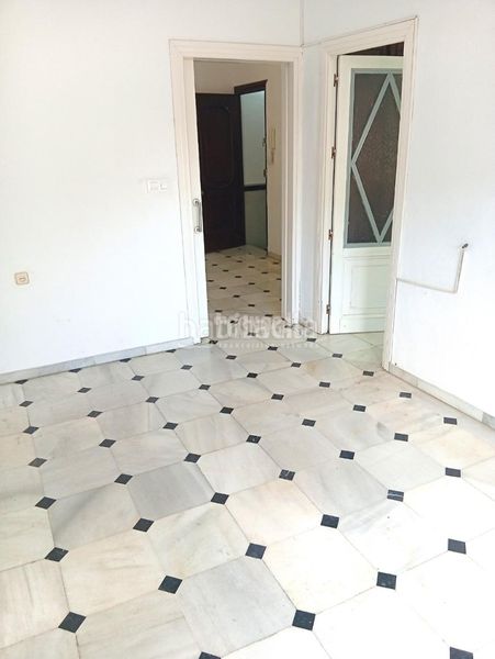 Foto 1fffae96-b627-457e-8990-56c2ba498be7. Casa aparellada amb aparcament a Coria del Río