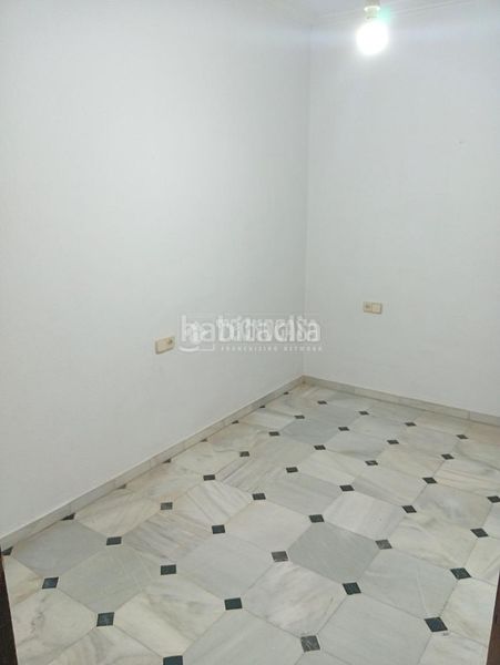 Foto 47a35415-cb9f-41e9-981f-492e0aeee484. Casa aparellada amb aparcament a Coria del Río