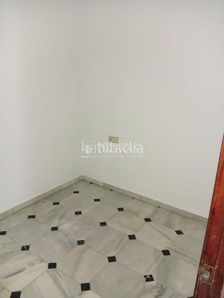 Foto 8345a42e-cee2-4f1d-98c4-80d279976235. Casa aparellada amb aparcament a Coria del Río