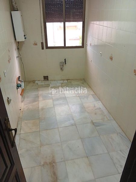 Foto 83910e44-fd52-4c39-9adb-8b45ee062436. Casa aparellada amb aparcament a Coria del Río