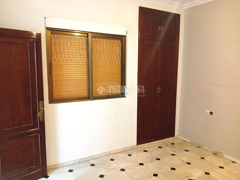 Foto af1eb82b-e15c-4fe8-9ce3-017e61589737. Casa aparellada amb aparcament a Coria del Río