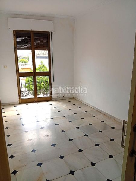 Foto d2ff7a08-935a-4aaa-874a-849cc854b97f. Casa aparellada amb aparcament a Coria del Río