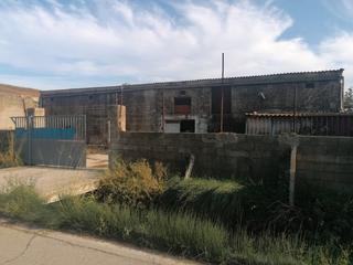 Finca rústica a N/a. 5 hanegadas mas nave industrial