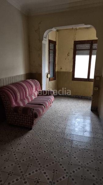 Foto 684cb2a8-2629-49c6-85b6-5f47033bd3f5. Casa amb aparcament a Bellreguard