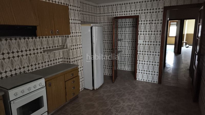 Foto 8ab00d9b-c536-49c0-a545-5ae50a47310a. Casa amb aparcament a Bellreguard