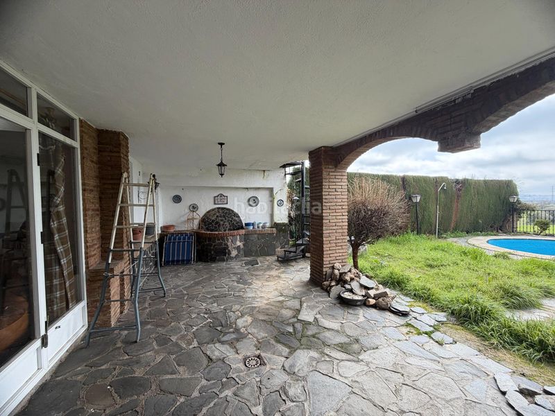 Foto b1dbad72-9762-4fb1-984d-f3ed1d33b57a. Casa adossada amb piscina a Camino de los Neveros - Serrallo Granada