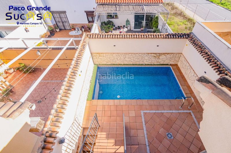 Foto f5a787a8-9547-41b6-b284-8430eef8b488. Casa adossada amb calefacció aparcament piscina a Zubia (La)