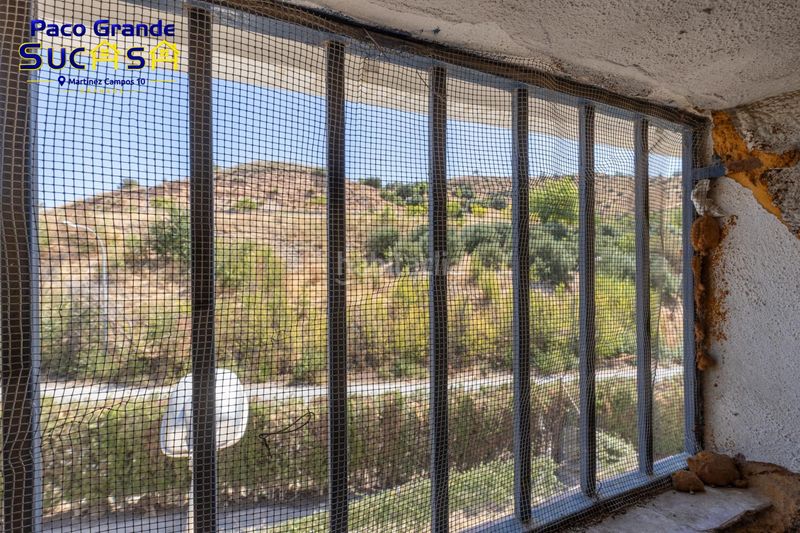 Foto cfa8eb97-c635-43bb-8a90-f6e546e03d2c. Casa en carretera 22 propiedad singular con más de 1.500 m2 construidos y 2.000 m2 de parcela! en Iznalloz