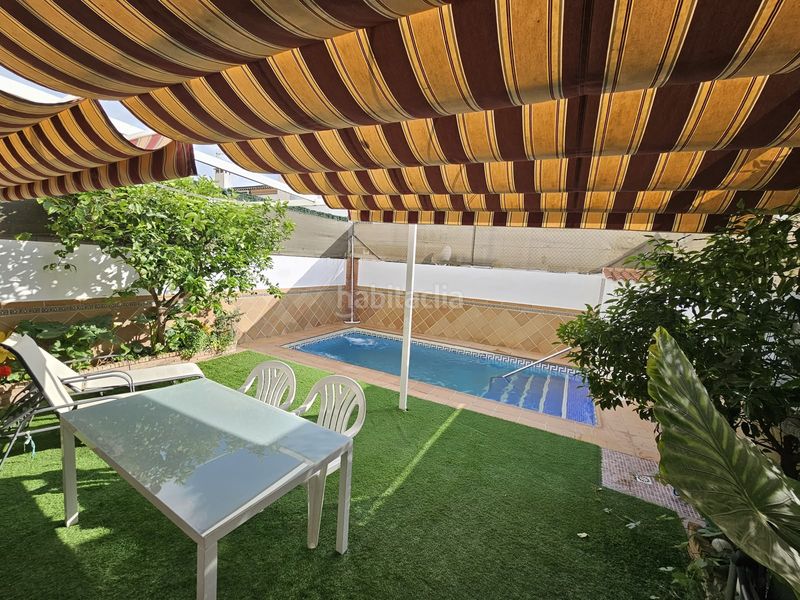 Foto 0c24ef89-0450-44e4-91ff-067ea405cb85. Casa adossada amb xemeneia calefacció aparcament piscina a Pulianas
