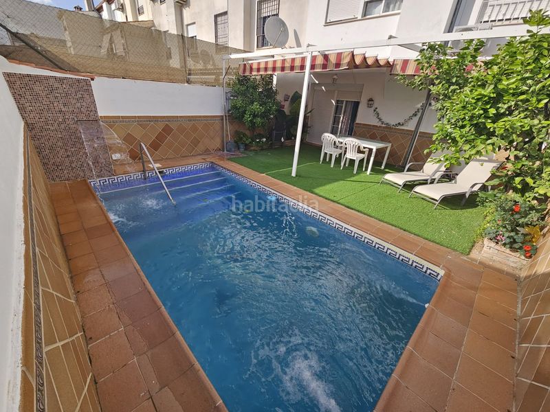 Foto 7a2e2d46-8e85-4db0-8460-de09f9b33660. Casa adossada amb xemeneia calefacció aparcament piscina a Pulianas