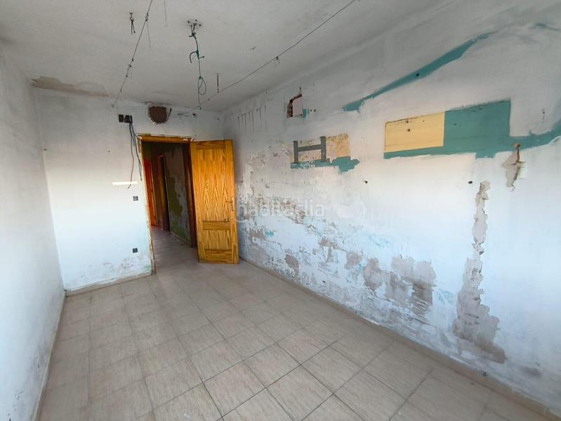 Foto b7fe4f0d-4d67-4cb9-b635-569c10079a39. Casa adossada amb aparcament a Güevéjar