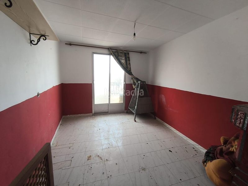 Foto b5b7529d-6dc6-4509-9434-2543fdd9ea09. Casa adossada a Lanjarón