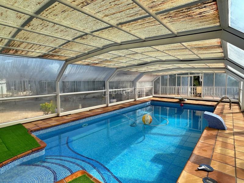 Foto ee68c2e6-9408-4aea-b552-41c7c400f541. Chalet with parking in Aldover