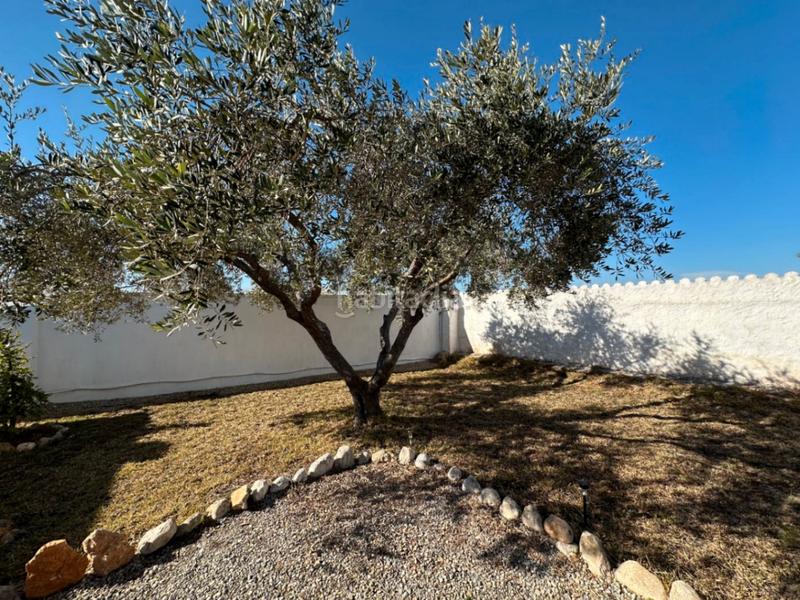 Foto c4722373-a87a-4c2f-a2f9-f0a7d6206991. Chalet villa en venta en playa el moro, 5 dormitorios. en Alcossebre