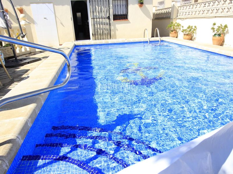 Foto a92334d8-4153-4242-b12c-3df46ce6e61d. Casa amb aparcament piscina a Centre Miami Platja