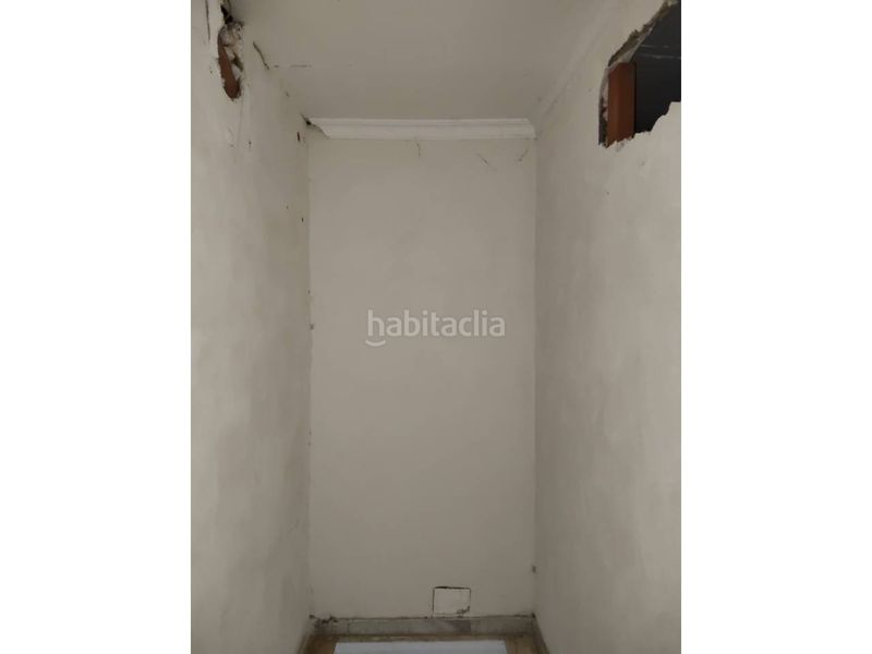 Foto 52ec206e-6d69-425c-84cf-312d18d29731. Casa adossada a calle ferrobús 10 a Cantillana