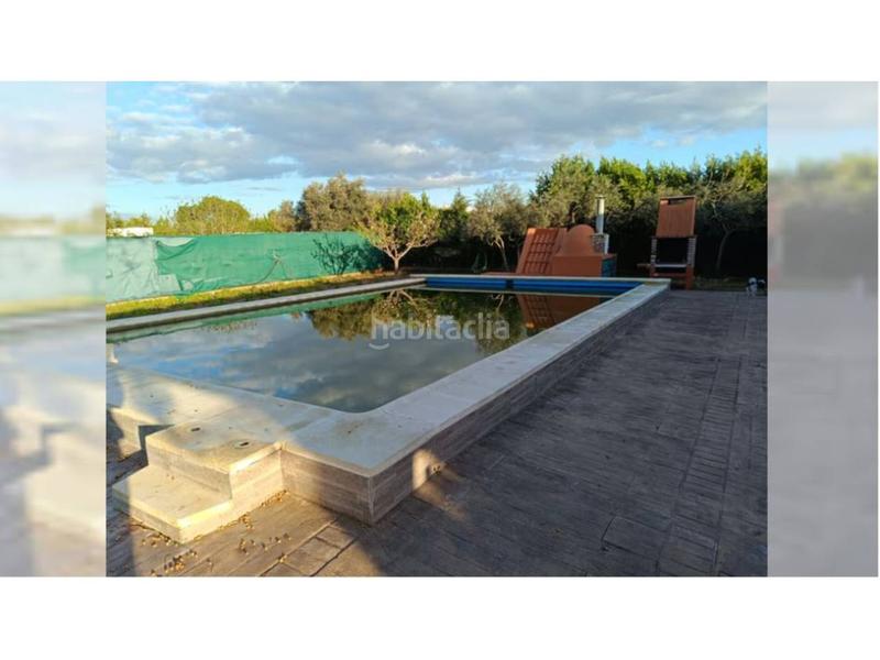 Foto f3521bdf-931f-4461-bc4a-c3cb7e72ad19. Xalet amb aparcament piscina a Carmona