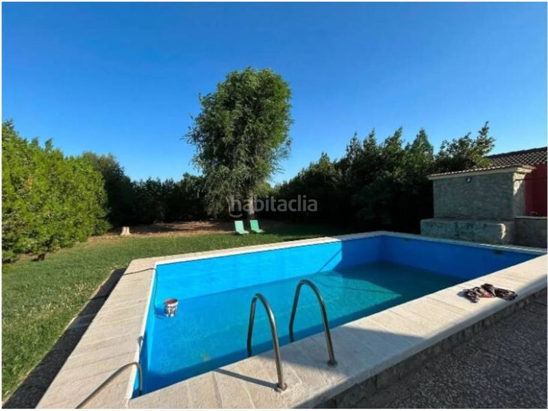 Foto f2922bf2-a586-4941-8b5b-e48d6a8ec855. Xalet amb calefacció aparcament piscina a Rinconada (La)