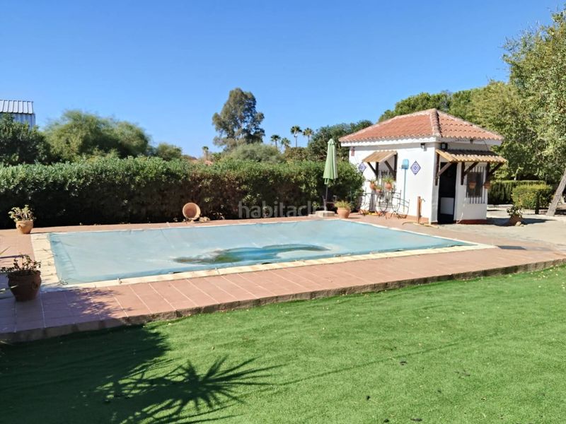 Foto 9f12ac05-2fa5-471d-9a86-3ff1d1e6edc9. Chalet avec chauffage parking piscine dans Carmona