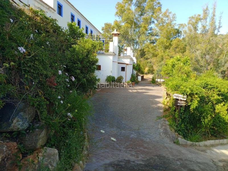 Foto b2d9150c-168c-41bd-928e-b612edbd78b7. Edifici a Guaro