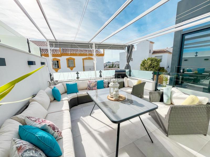 Foto 3ef46fd9-1dc8-4296-bbe6-4f03d6d57c46. Location maison jumelée avec parking piscine dans Arroyo de la Miel Benalmádena