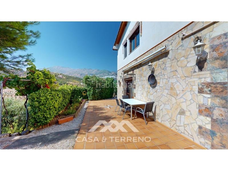 Foto bade52ef-a777-4ff0-a7ad-c235642a483c. Casa amb calefacció aparcament piscina a Frigiliana