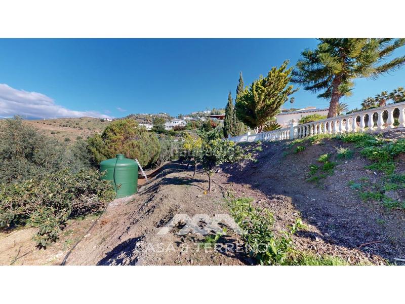 Foto 6af03863-667c-495e-804e-a792c6695094. Casa se vende elegante villa con jardín y piscina , málaga en Algarrobo