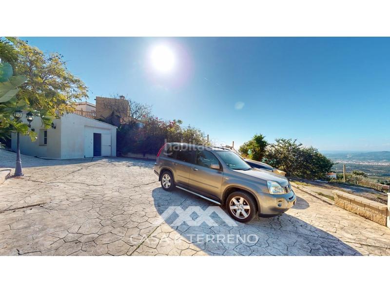 Foto c32451cb-78e0-45a5-8918-9d713e16c29c. Casa se vende elegante villa con jardín y piscina , málaga en Algarrobo