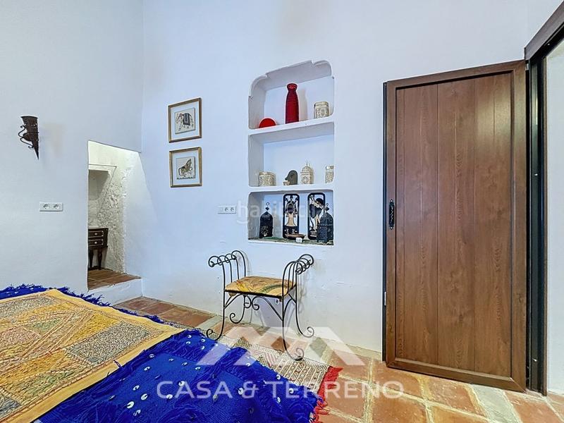Foto 46e214b6-e338-4276-b04c-5e79f44ea668. Masia amb piscina a Comares
