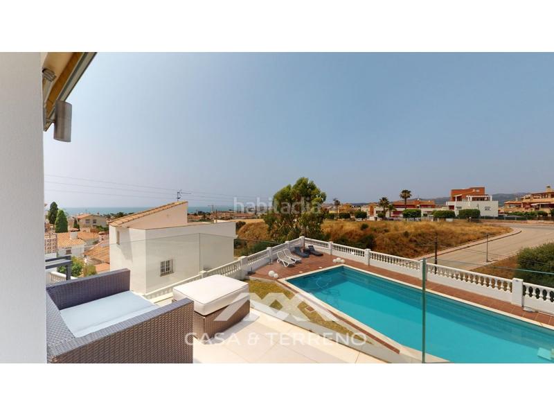 Foto eaae69ad-56ba-4bf9-86bd-656a6c235277. House with parking pool in Caleta de Velez