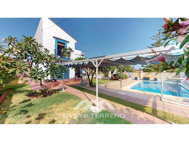 Foto 4038f7ae-e88b-4410-90f2-fd322b0db81c. Chalet se vende encantadora villa de estilo mediterráneo en Chilches