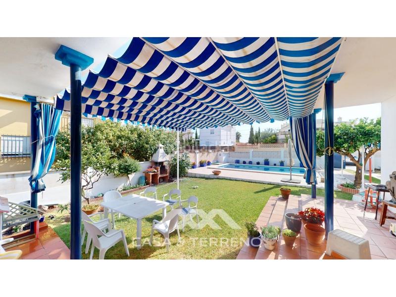 Foto c0c63627-740c-4e1b-a72a-7354cbb4133d. Chalet se vende encantadora villa de estilo mediterráneo en Chilches