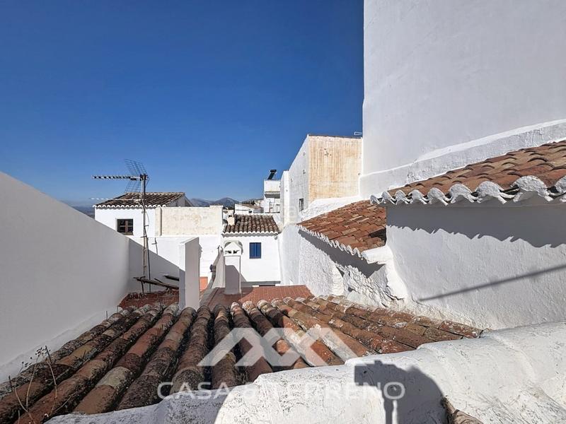 Foto 93d85378-1de4-45bd-b77f-6677e7d78b78. Maison jumelée avec parking dans Canillas de Aceituno