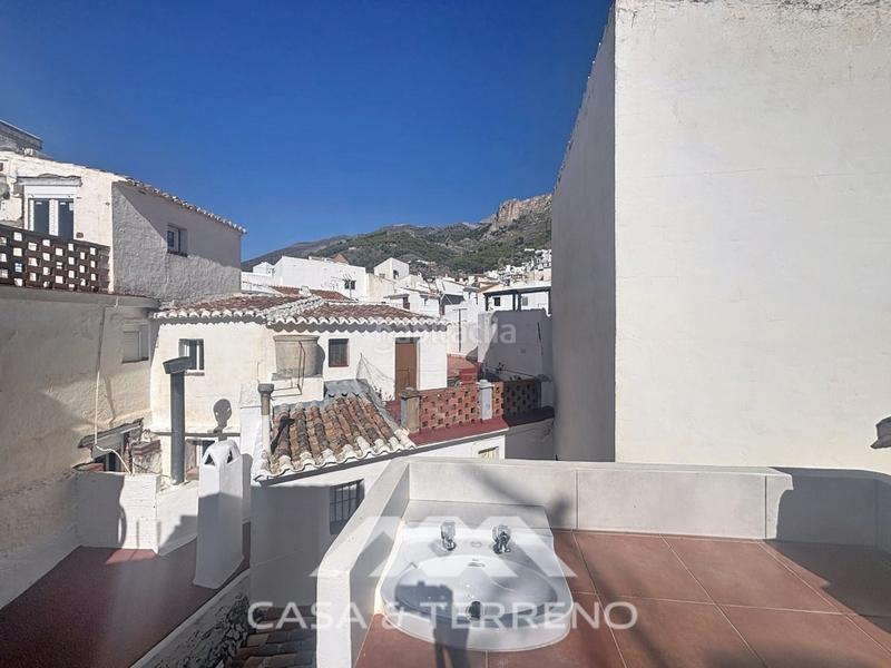 Foto 034bbb22-127d-475d-a4e1-3459b9d6581b. Casa adossada a Canillas de Aceituno