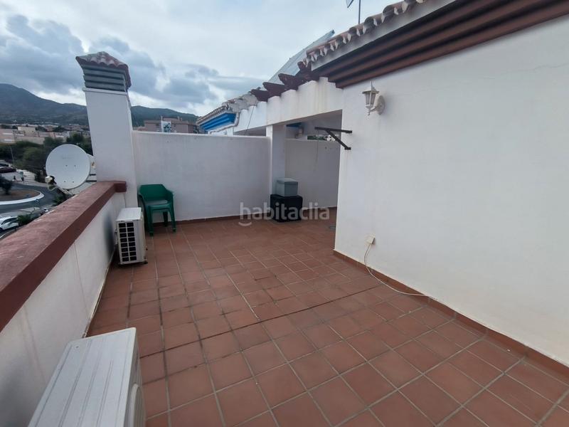 Foto 37c9e1a2-8a3f-44c2-b2d0-26a7c7f3dcbd. Casa adossada amb xemeneia aparcament a Montemar Torremolinos