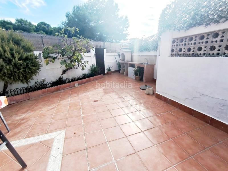 Foto 463cd2bc-b2e7-4a7c-bae0-a7e5117a8d14. Casa adossada amb xemeneia aparcament a Montemar Torremolinos