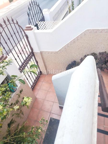 Foto b62eb22e-6d4a-4283-9d6b-e9fb712cbc3a. Casa adossada amb xemeneia aparcament a Montemar Torremolinos
